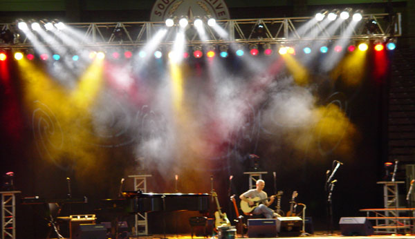 A stage set up for a concert with mood lighting